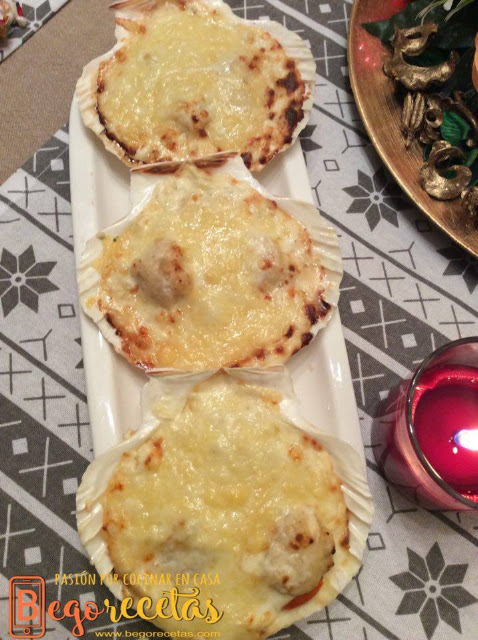 Vieiras en salsa de queso